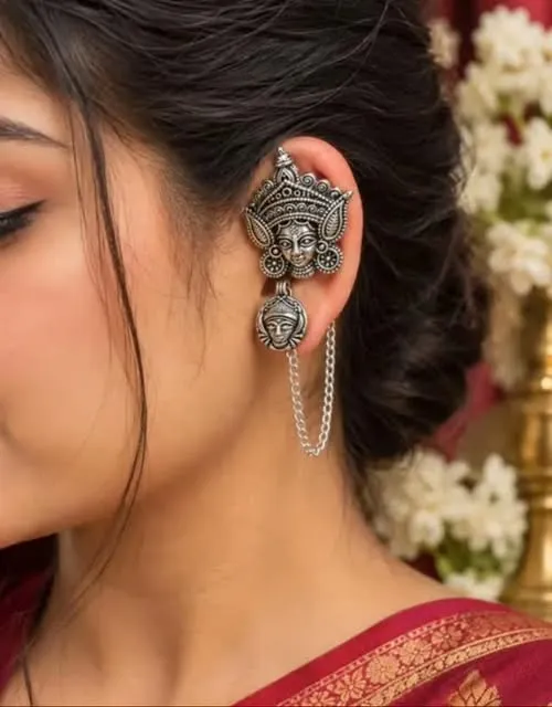 Maa Durga oxidised ear cuff worn with a red saree